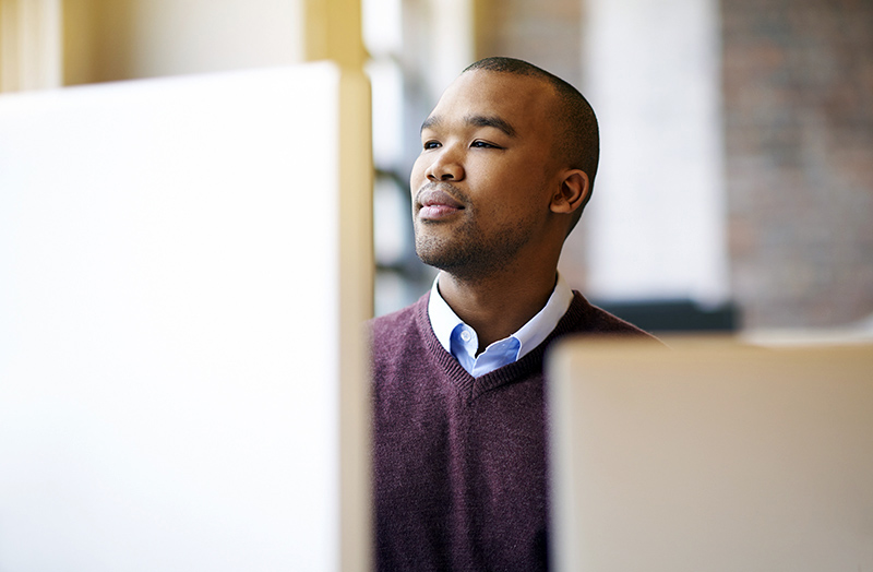 Man looking at monitor